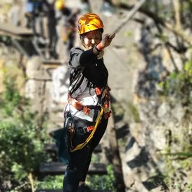 Traveller crossing an adventure bridge in Southern Africa